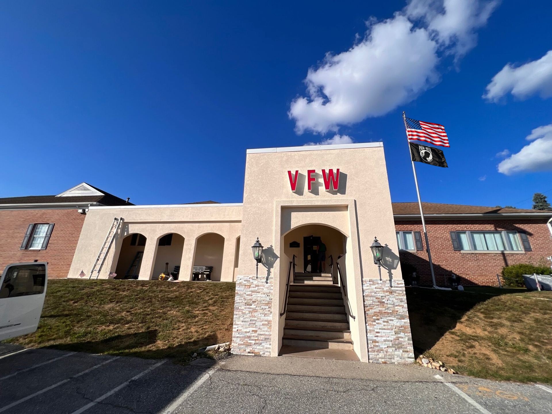 VFW post in York County painted and stuccoed by Bleecker St. Development, flags flying